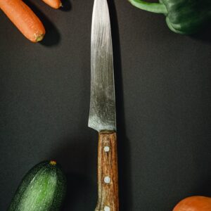 orange and silver kitchen knife